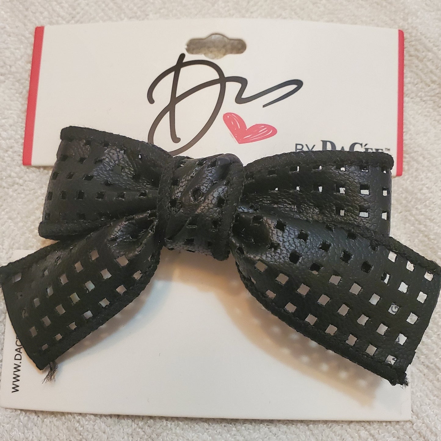 Small Black Perforated Leather Bow Clip